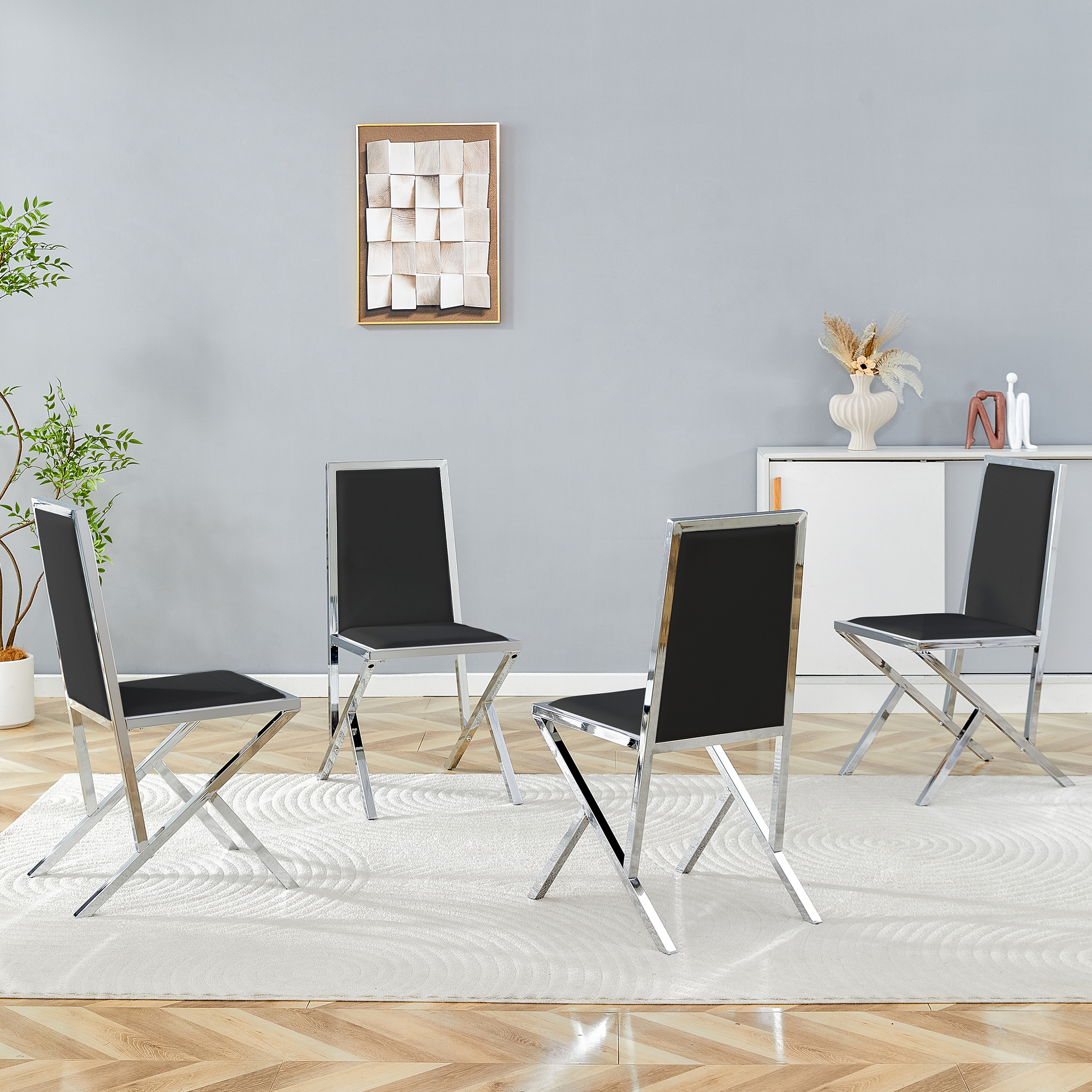4-pack Silver Metal Framed Black PU Dining Chairs Ergonomic Design, A Simple And Luxurious Choice.Featuring Uniquely Designed Silver Metal Legs.