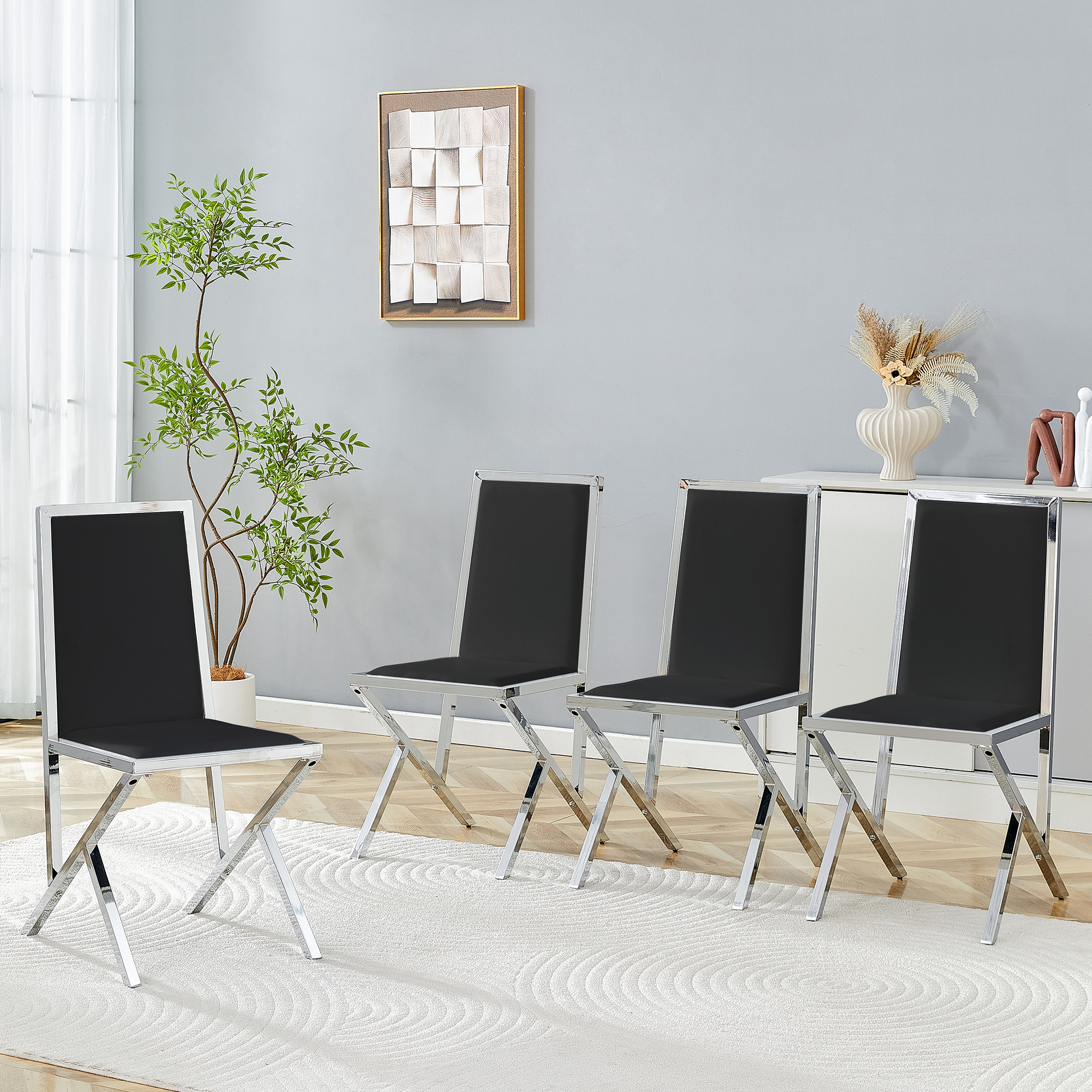 4-pack Silver Metal Framed Black PU Dining Chairs Ergonomic Design, A Simple And Luxurious Choice.Featuring Uniquely Designed Silver Metal Legs.