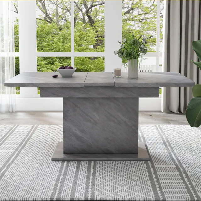 Ausziehbarer Esstisch im Beton-Look mit Stauraum