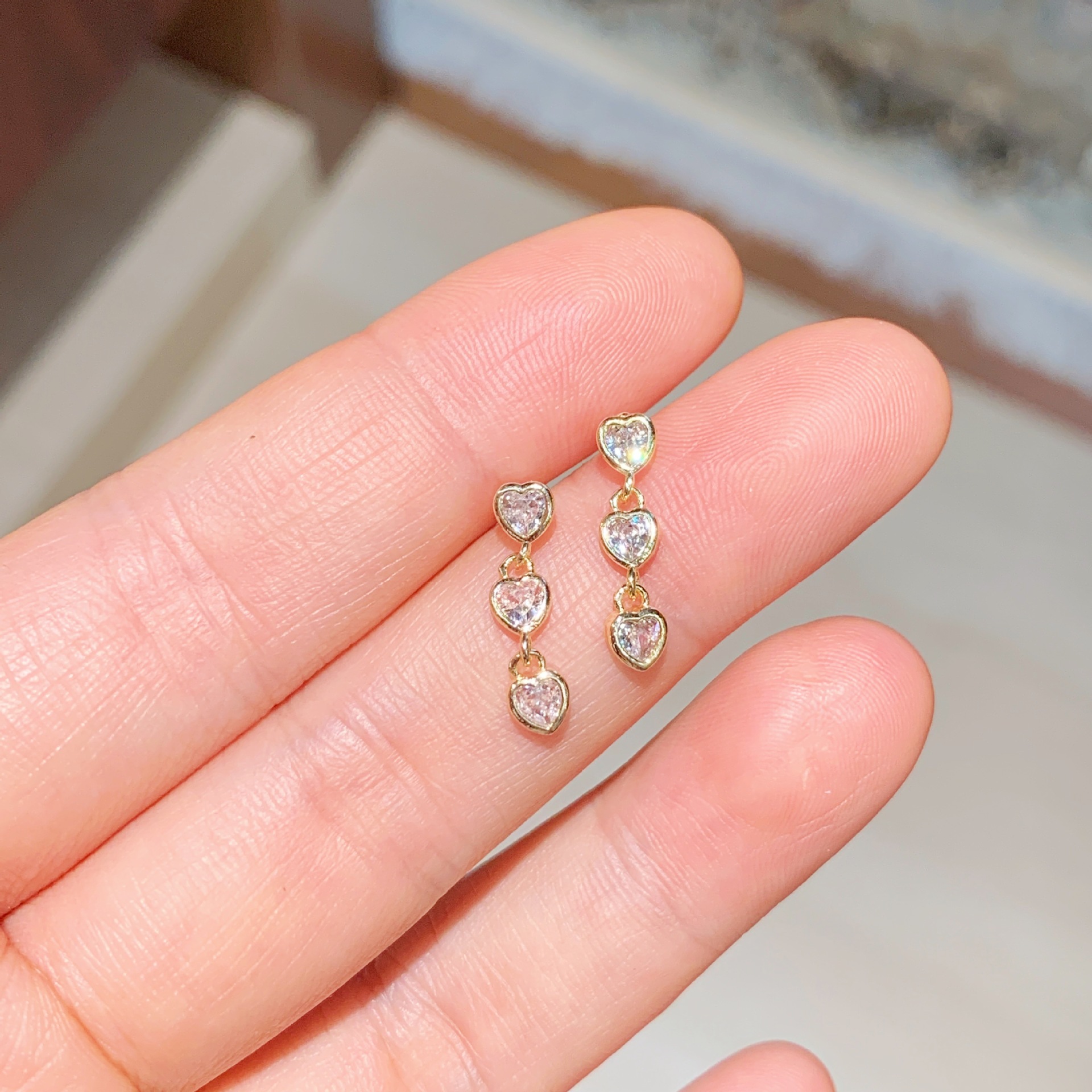 Interlinked Heart Zircon Stud Earrings
