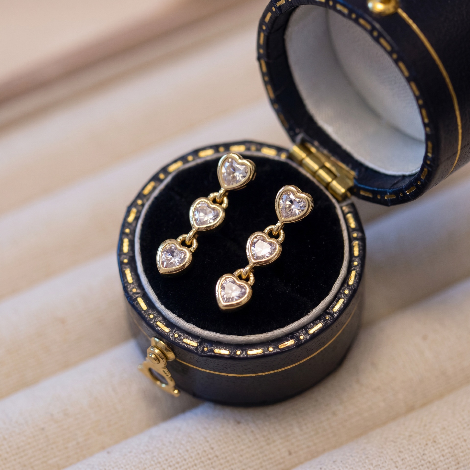 Interlinked Heart Zircon Stud Earrings