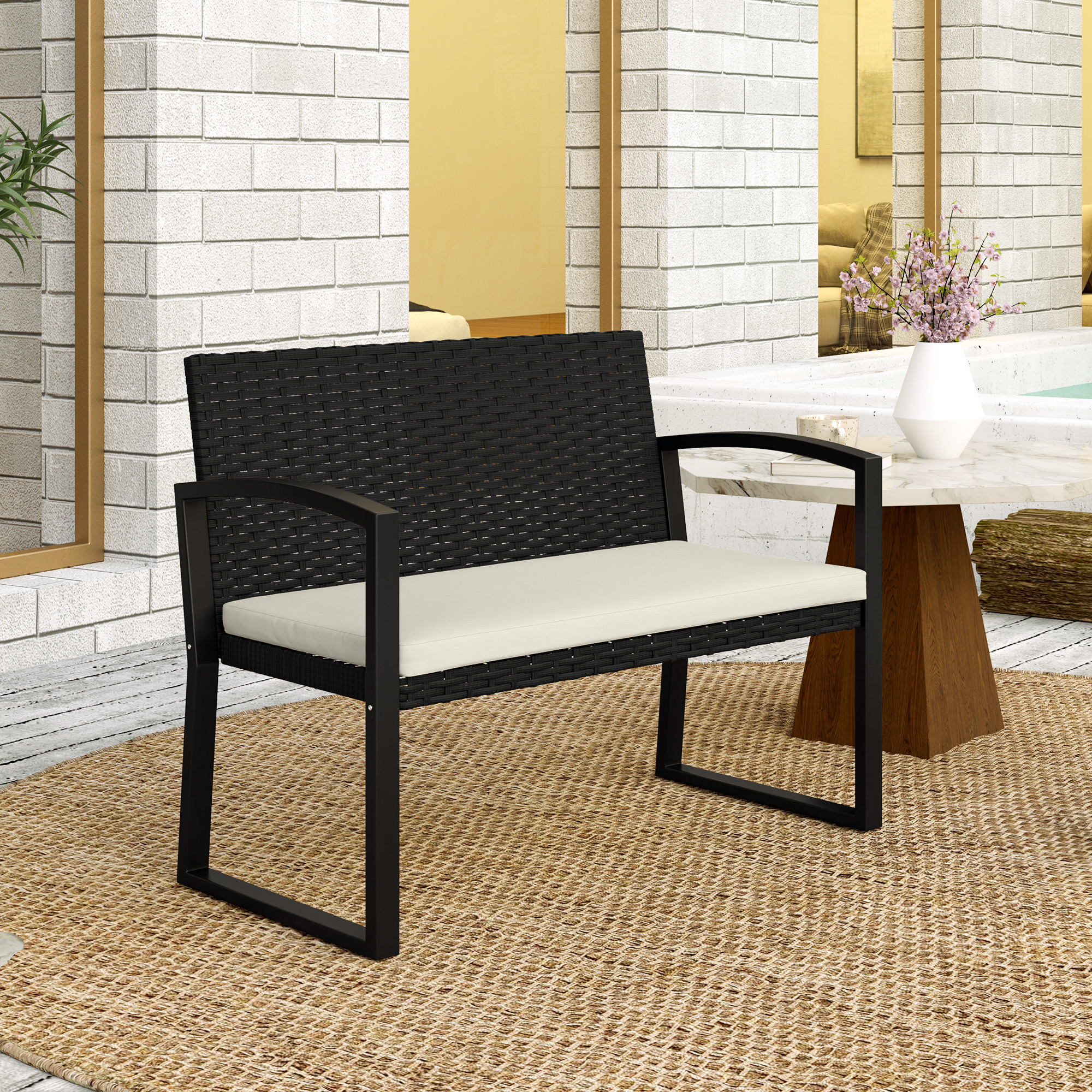 Double rattan garden bench