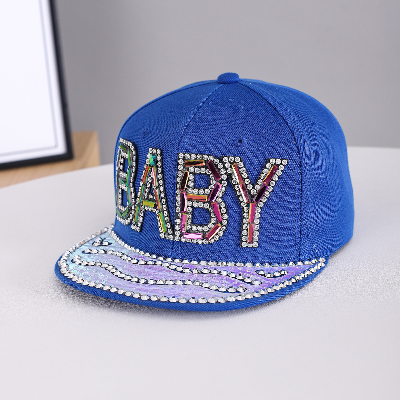 Men's And Women's Identical Colorful Diamond BABY Letter Hot Stamping Diamond Brim Hat. This Stylish Hip-hop Style Flat Brim Hat Is Suitable For Personalized Streetwear Outfits.