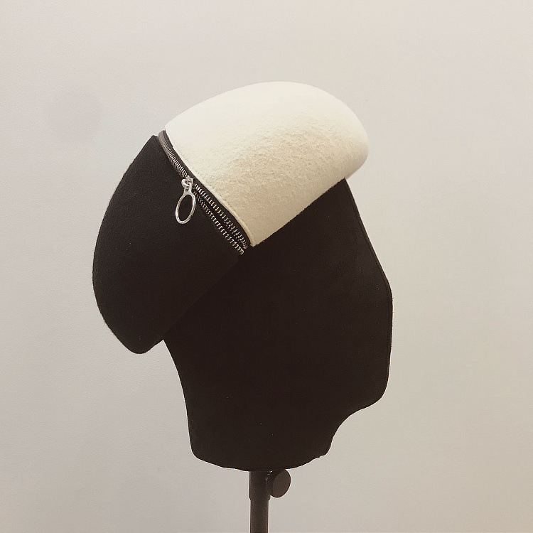 Title 1, Black and white wool felt hat with zipper and b...