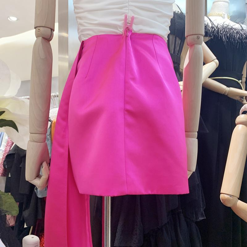 Title 7, Solid Color Bag Hip Flower Streamer Skirt. A st...