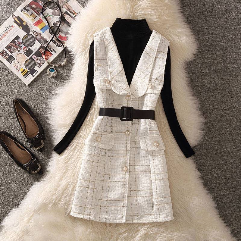 White Vest And Black Sweater