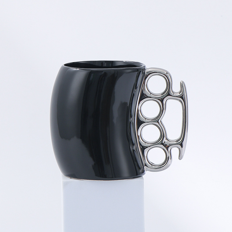 Black cup with silver handle