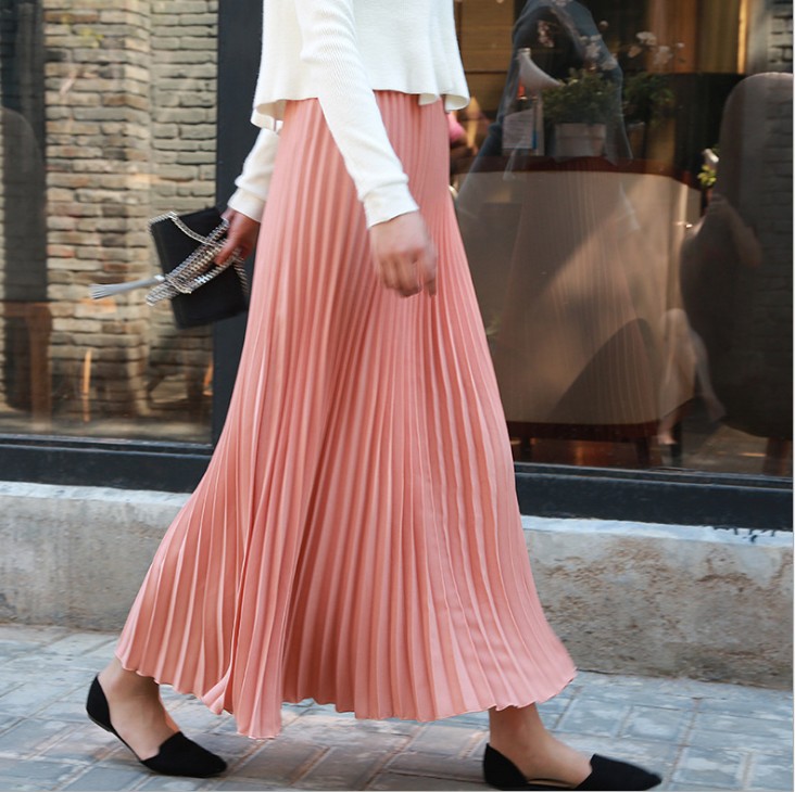 Title 12, Solid color pleated skirt offers effortless sty...