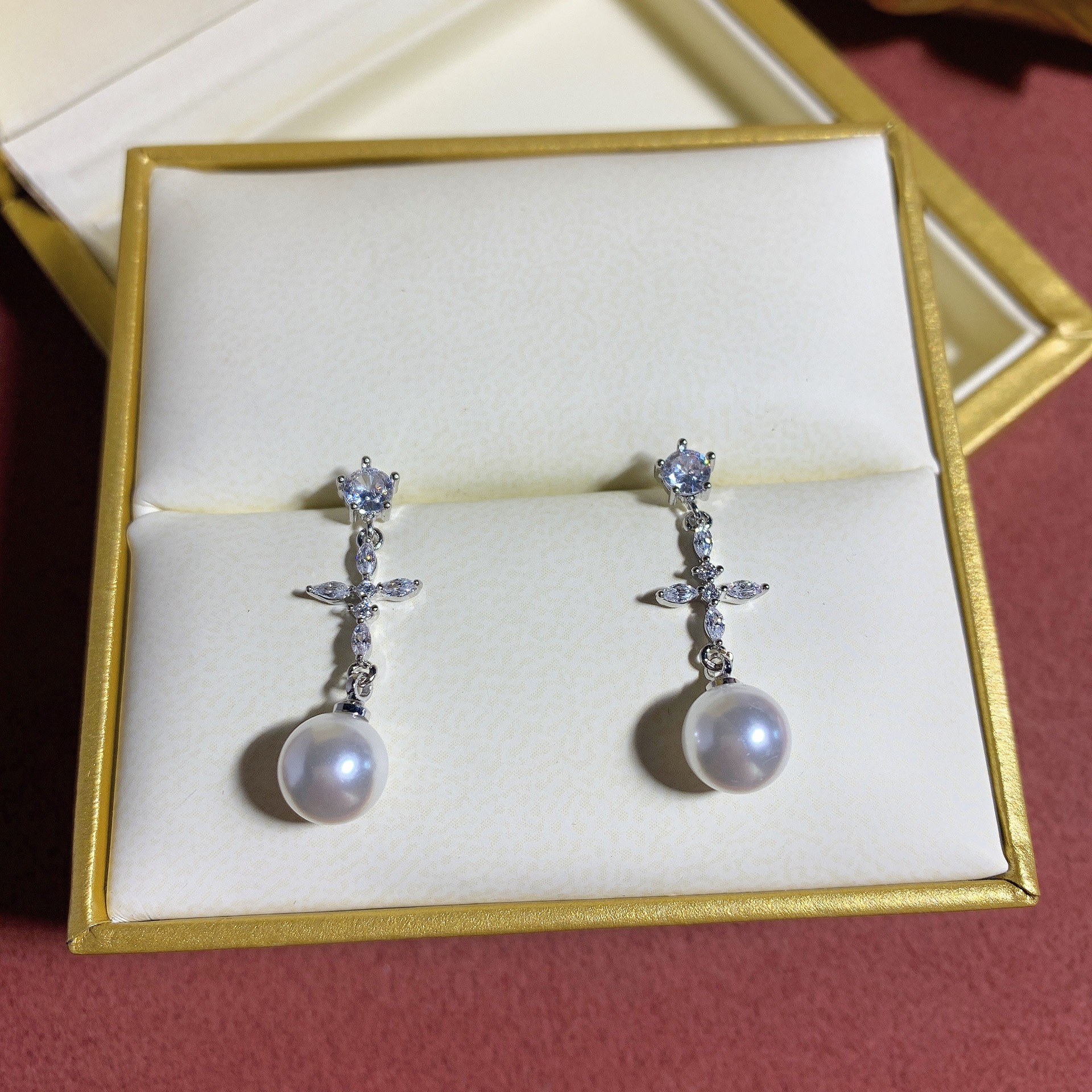 Elevate your elegance with the timeless beauty of La Perle™ Pearl Earrings. Crafted with meticulous attention to detail, each pair showcases lustrous, perfectly round pearls that embody sophistication and grace. Set in premium 14K gold, these earrings offer a classic yet modern design, making them a versatile addition to any jewelry collection.