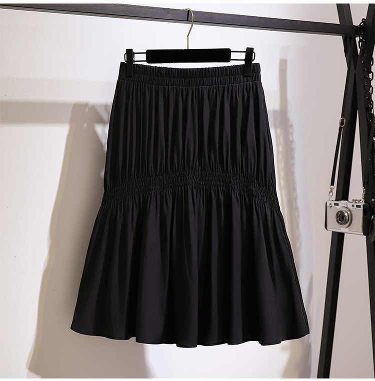 Title 4, Loose casual pleated skirt covering the belly, ...