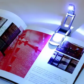 Reading light, book folding