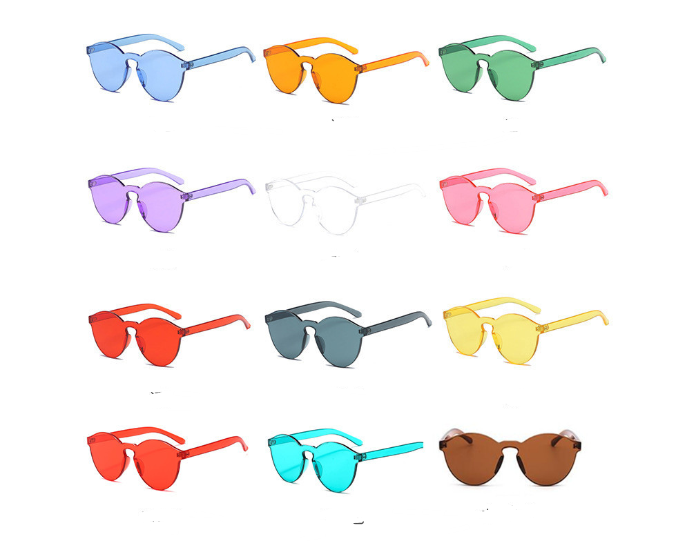 12 color frameless conjoined jelly transparent sunglasses Europe and America candy color glasses integrated marine film ladies sunglasses
