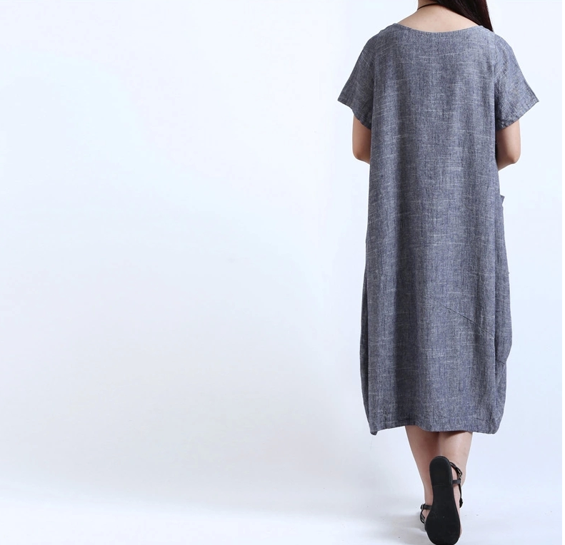 Long size large size cotton and linen dress in loose pocket