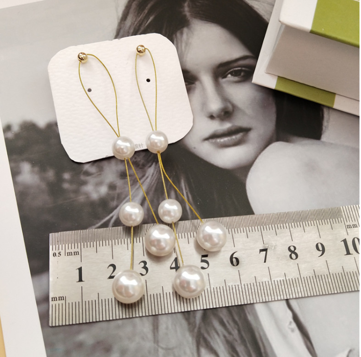 Personality exaggerated earrings autumn and winter earrings earrings long section pearl tassels 925 silver needle net red temperament earrings female