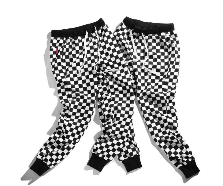 Couples pants new European and American street tide beam feet pants Harajuku black and white thousand bird pattern hip hop nine pants