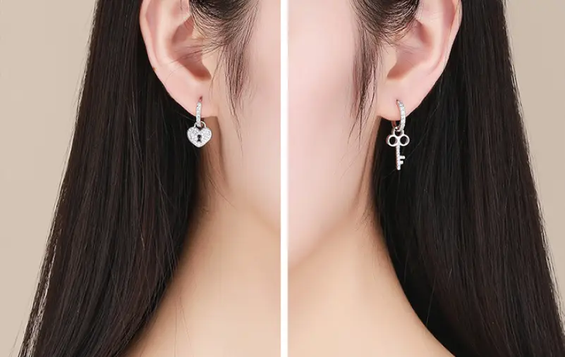 Earrings female European and American love lock 925 sterling silver romantic platinum-plated asymmetric allergy temperament earrings SCE577