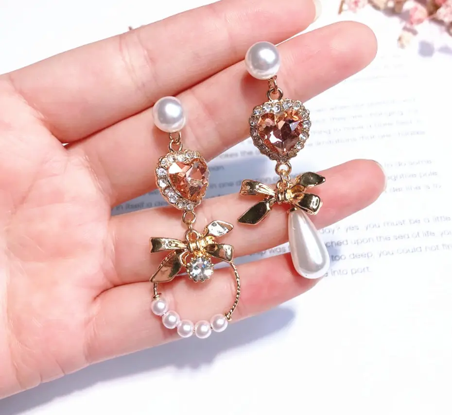 Metal bow with diamond heart love orange gemstone pearl tassel earrings