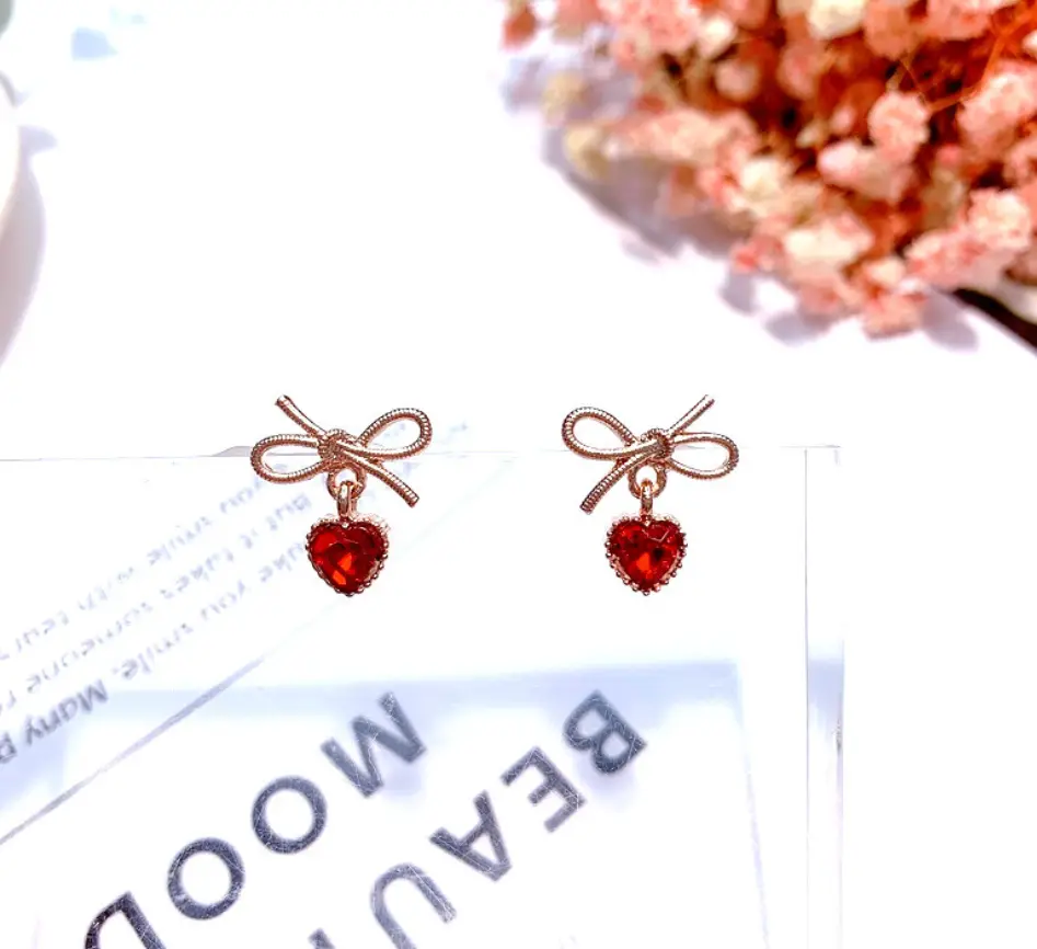 Stud earrings female 925 silver pin tide Korea simple small high-end love bow bow earrings net red lady earrings