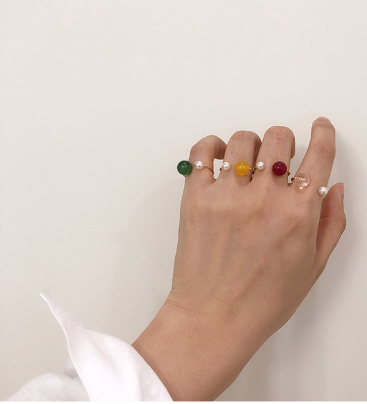 Geometric U-shaped colored pearl earrings