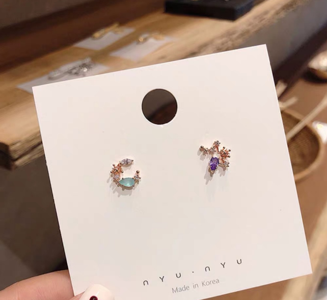 Asymmetrical moon zircon earrings