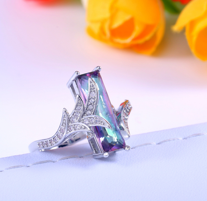 خاتم ألماس بتوباز سباعي الألوان