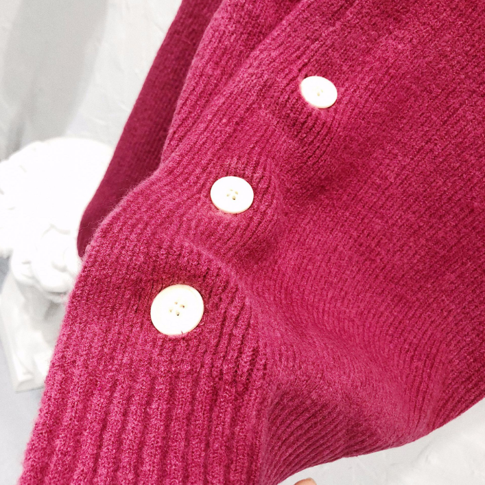 Irregularly buckled pleated powder sweater