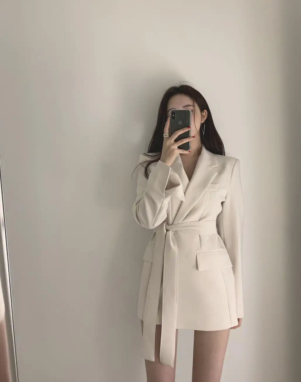 A belted suit jacket