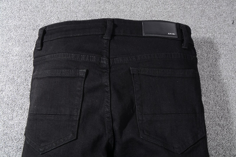 Ripped men's rhinestone jeans