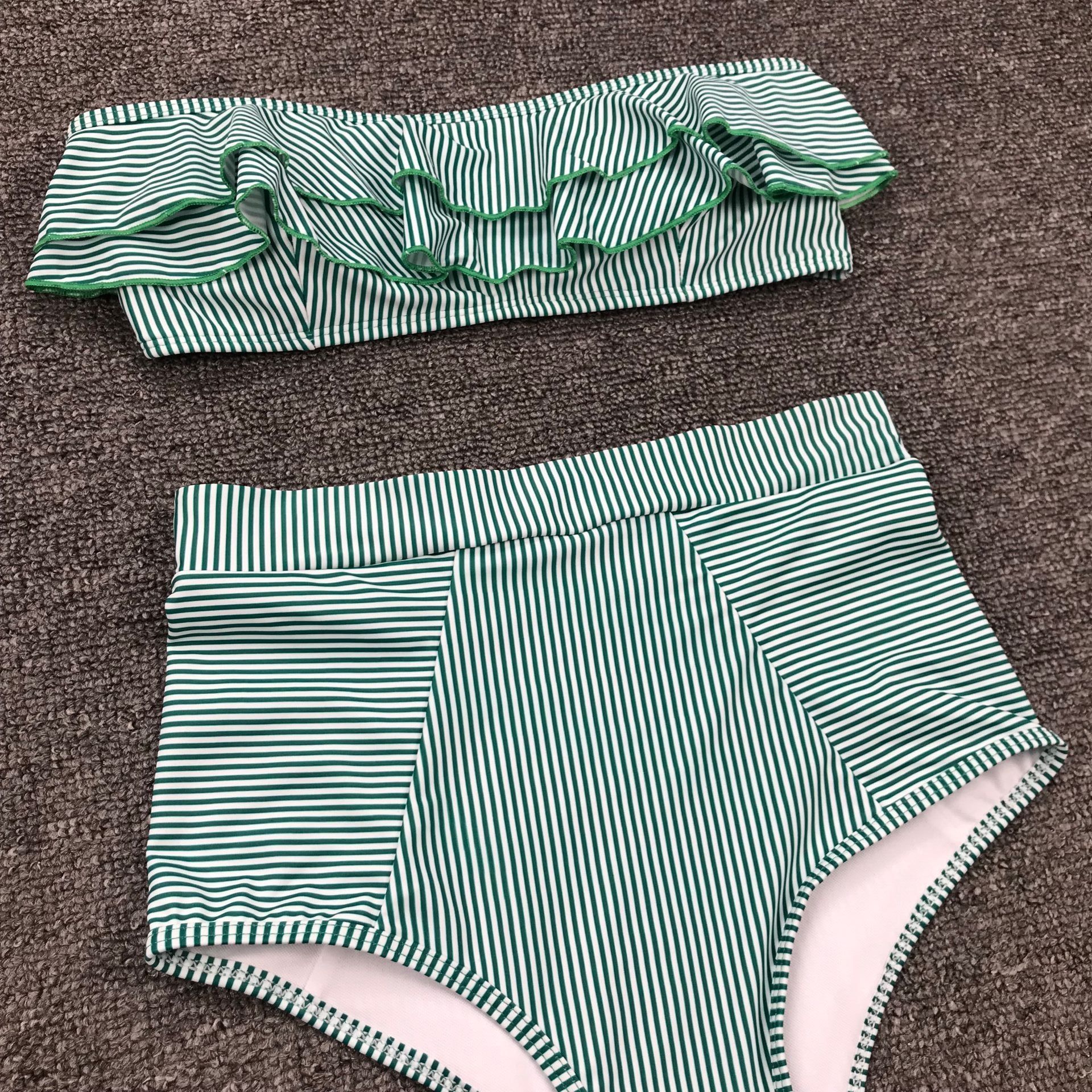 Split swimsuit with irregular stripes