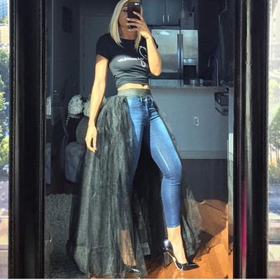 Match it with a skirt with long trousers and a sheer skirt