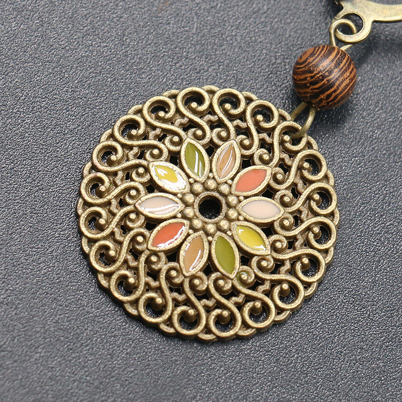 Vintage Hollow Alloy Drip Earrings