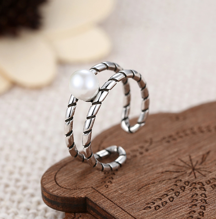 Twisted pearl ring