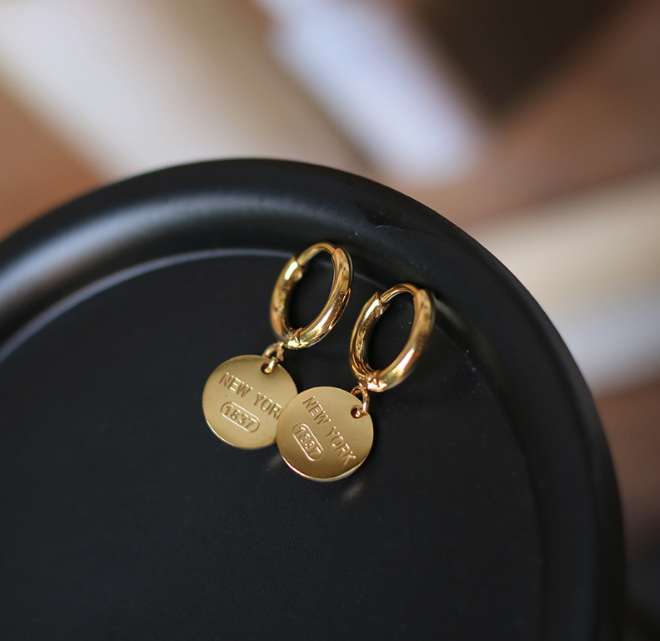 Women's metal disc earrings
