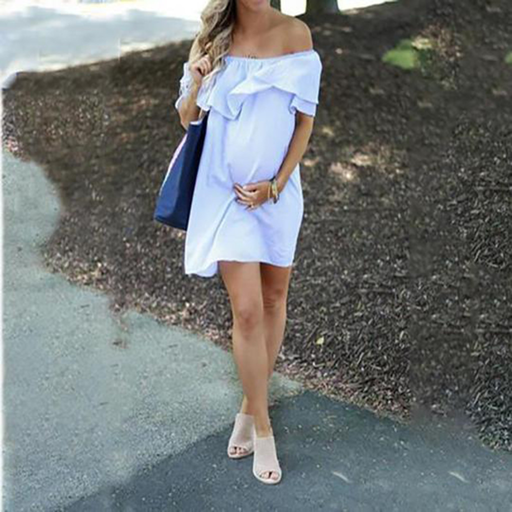 821134853125 - Maternity dress with shoulder flounce