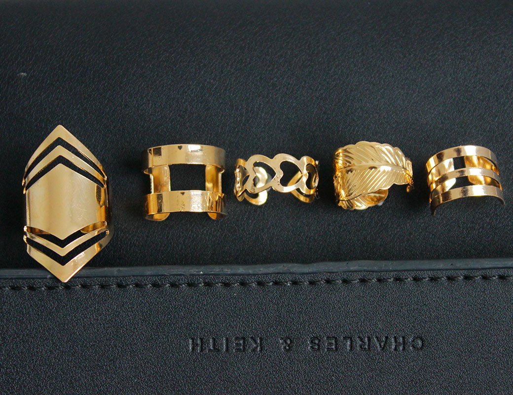 Five-piece openwork alloy ring