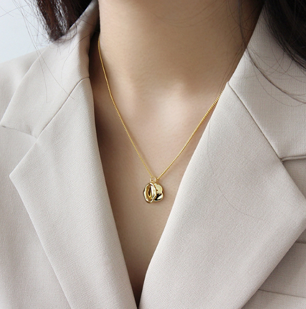 Geometric irregular ring necklace