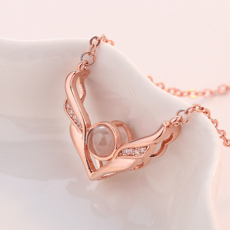 Hundred languages i love you wings necklace