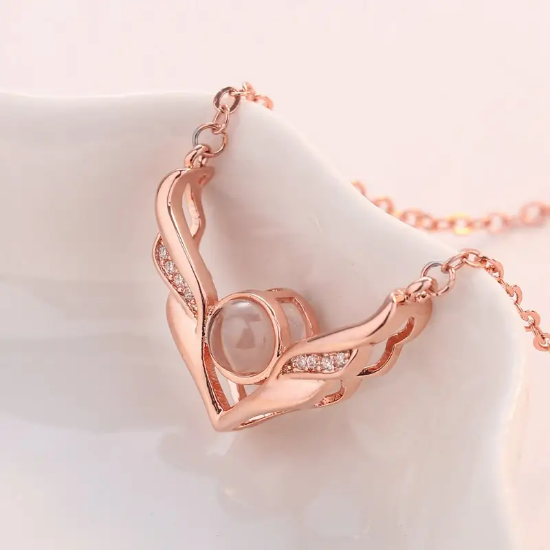 Hundred languages i love you wings necklace
