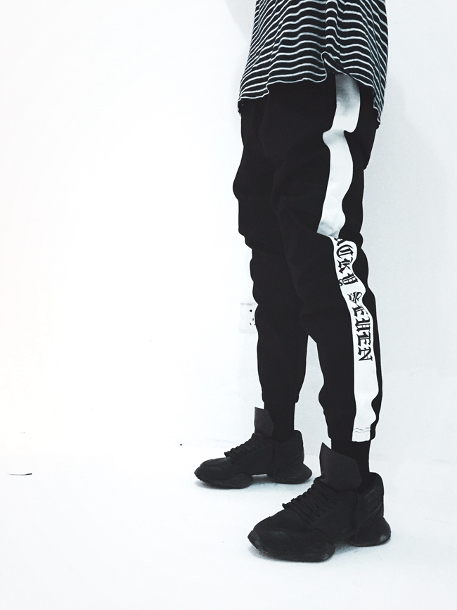 Black and white goth character track pants