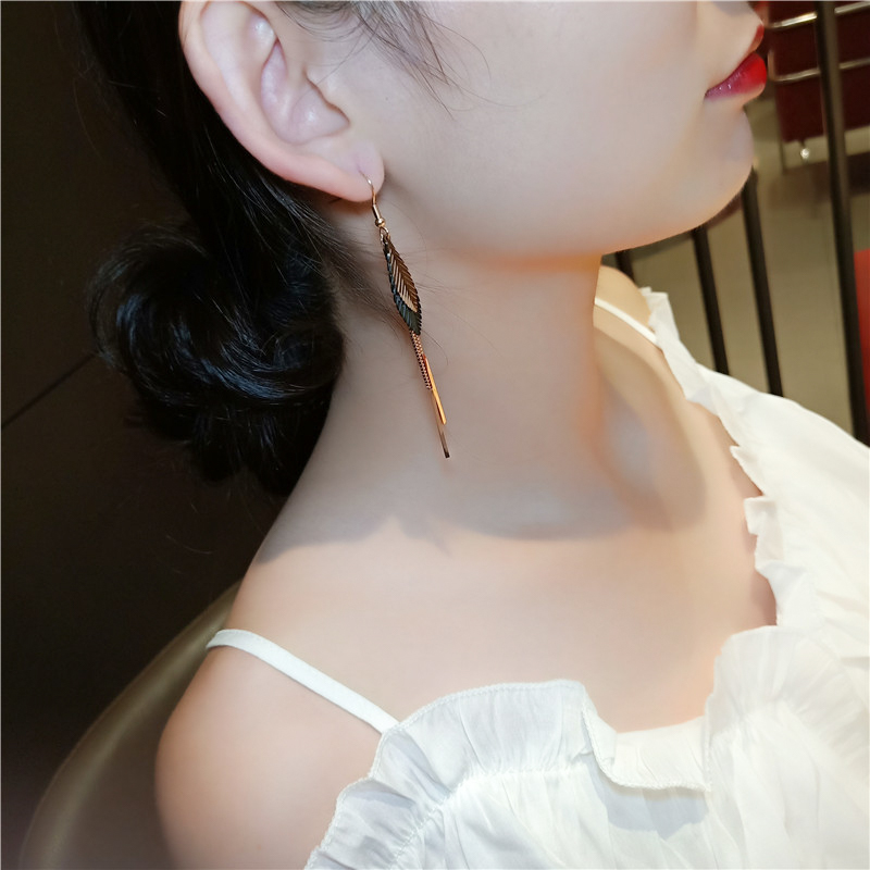 Leaf long tassel earrings