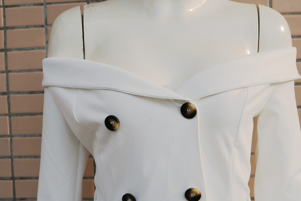 Off-the-shoulder long-sleeved beige dress