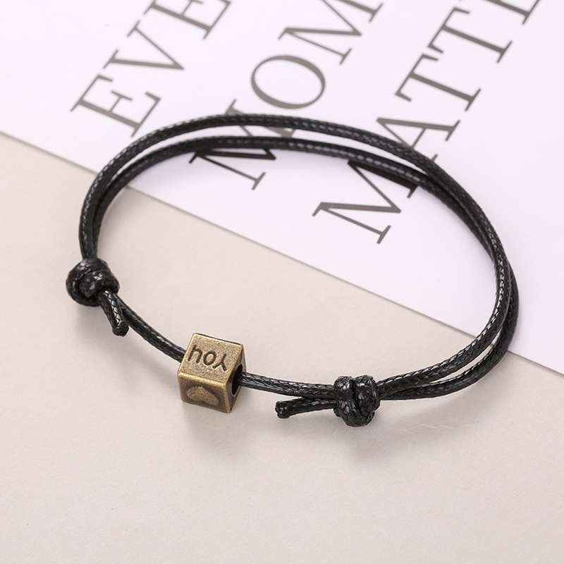 Vintage distressed bronze and silver love bracelet