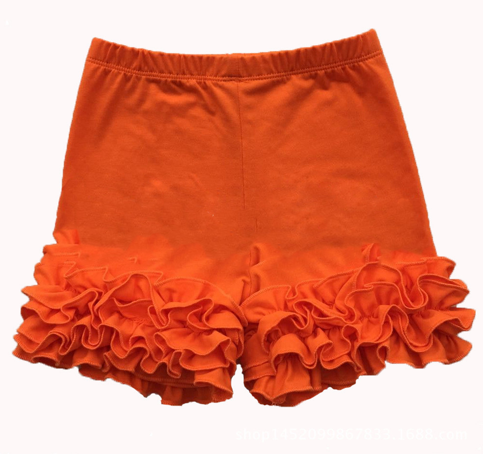 Girls' ruffled shorts in Orange
