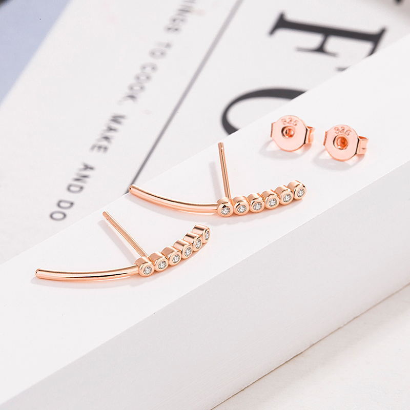 E-shaped silver stud earrings