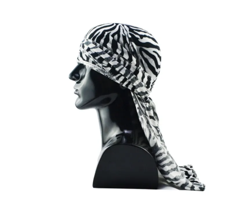 Plush printed long tail hat - Zebra