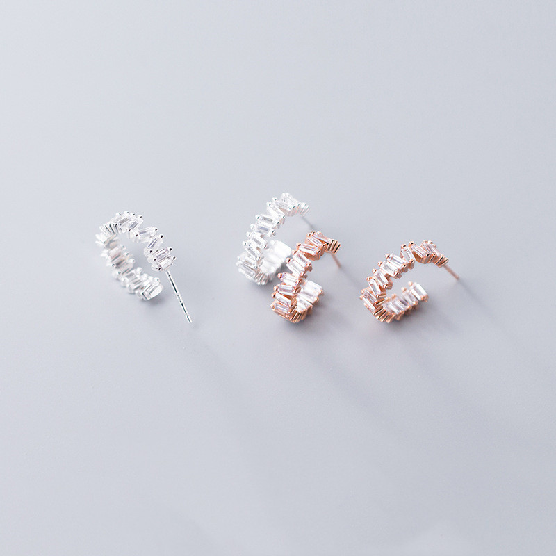 Design ear studs are small and compact