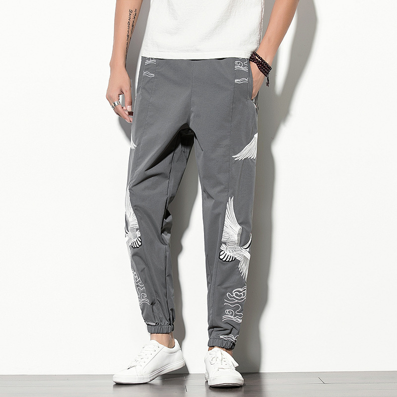 Embroidered crane legs