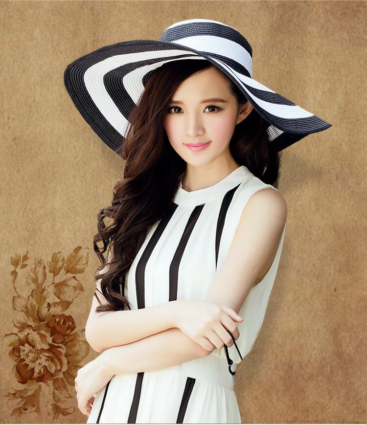 Black and white striped straw hat along the beach