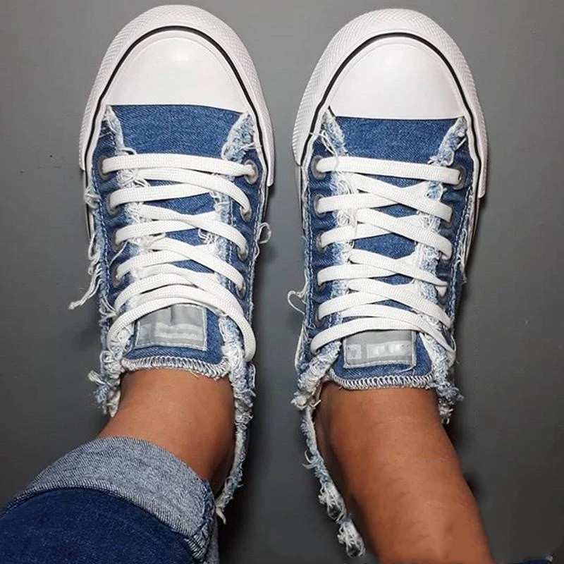 Distressed low-top canvas shoes