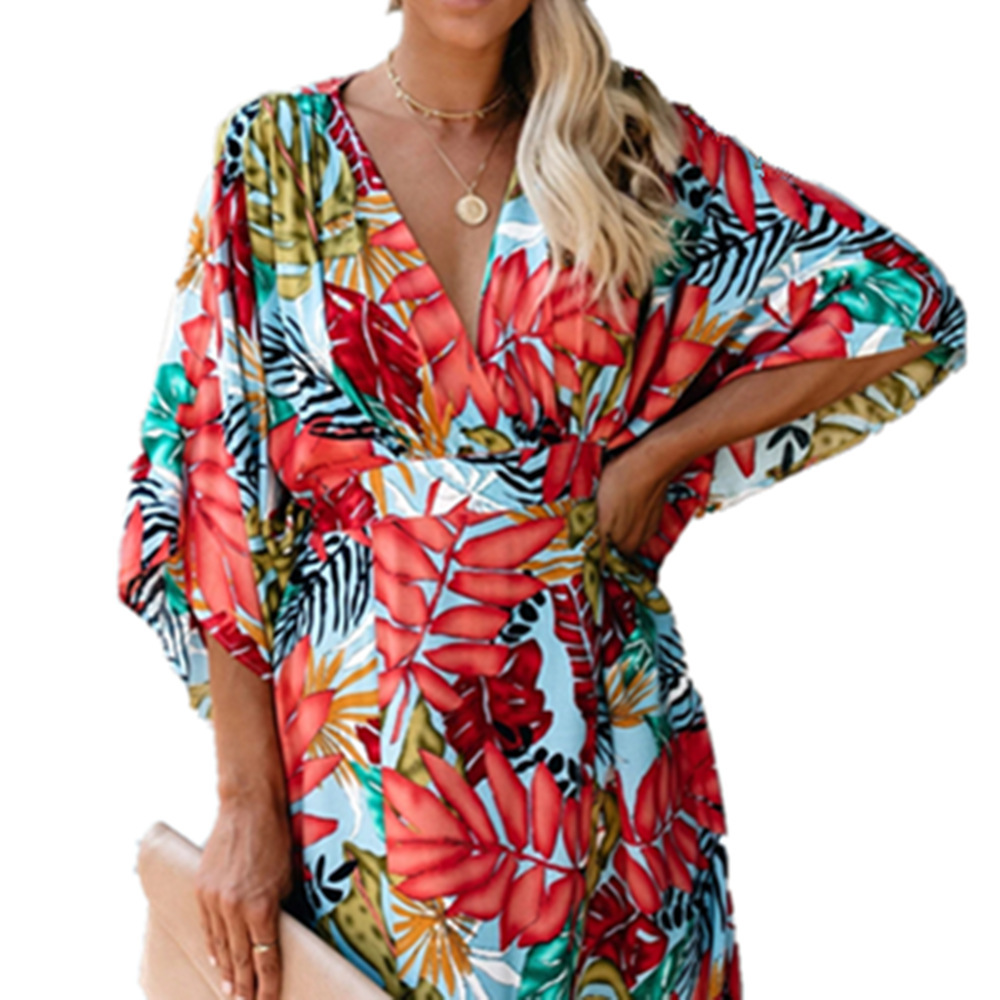 Irregular long-sleeved dress with leaf print